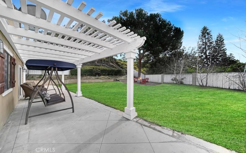 Large backyard with chair swing