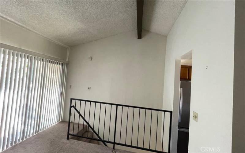 Top floor looking out to private patio.