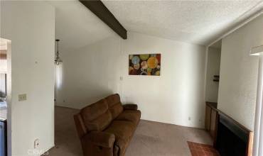 Top floor living room and fireplace.