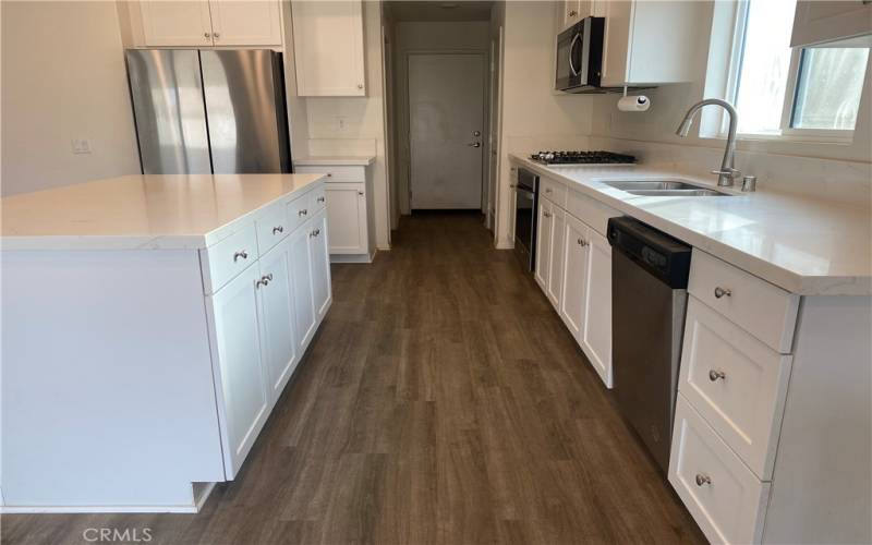 Kitchen, leading to garage door.