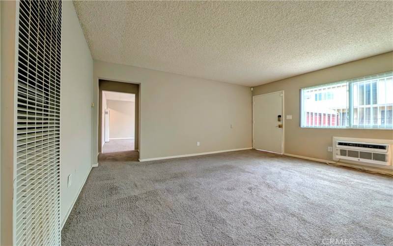 Family Room, with Hallway to Living Room and Den/Office Space