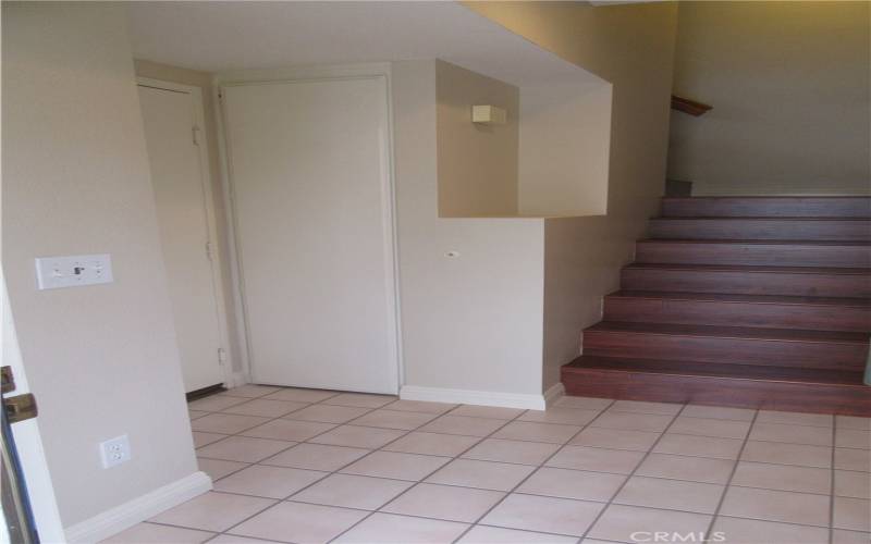 Ground floor entry way to upstairs condo