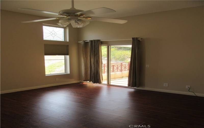 Primary bedroom with door to patio