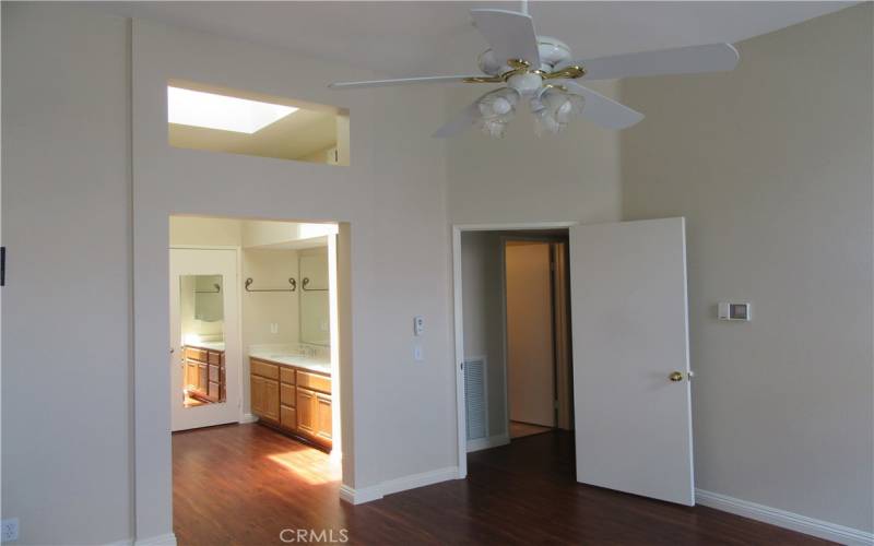 Primary bedroom with adjoining bathroom