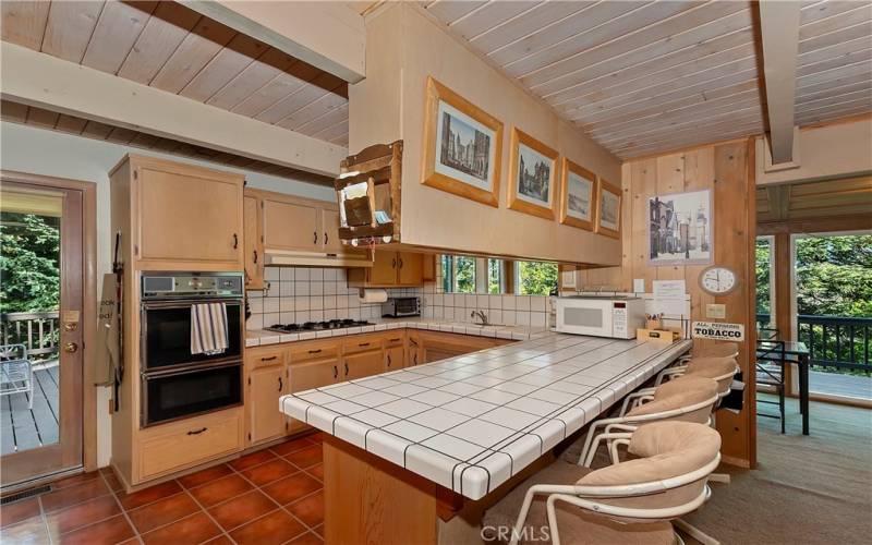 Kitchen And Breakfast Bar With Main Deck Access