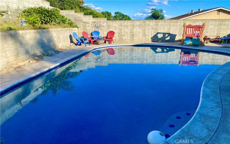 Relaxing pool has been replastered with pebble teak.