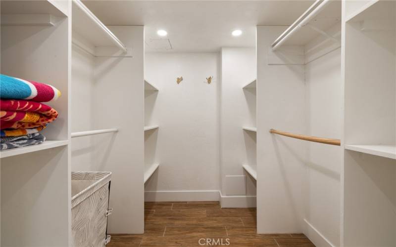 Primary bedroom walk-in closet