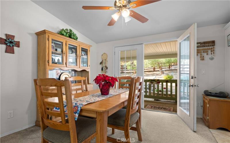 Main home dining room that leads out to the rear deck and yard.