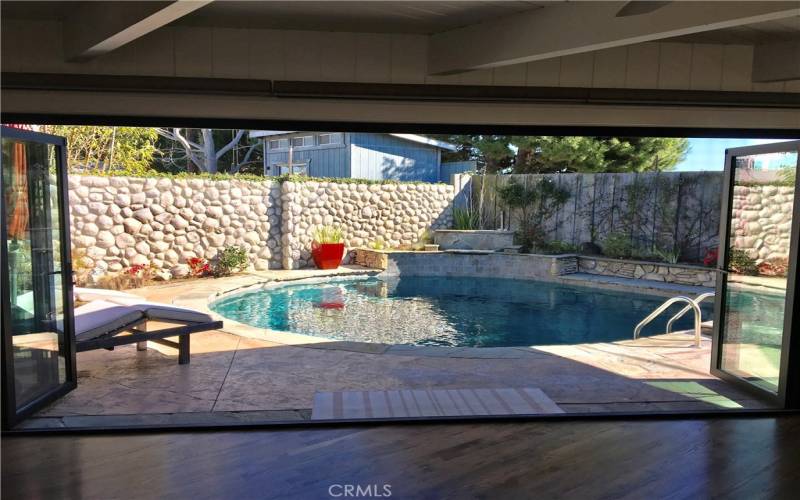 Open up the wall of La Cantina doors....a sparkling pool, spa, and gorgeous backyard.