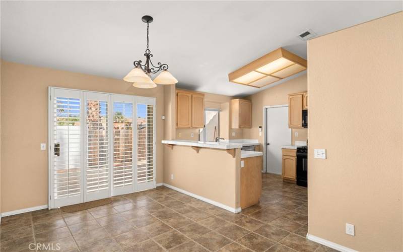 kitchen open to dining room and direct garage access