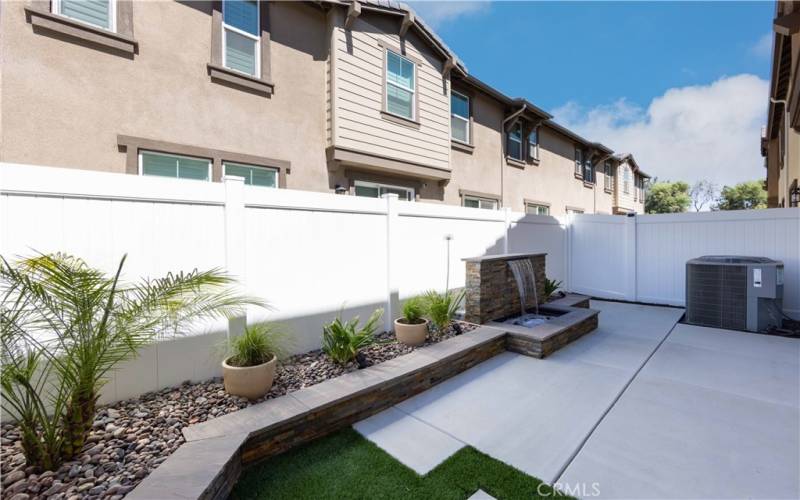 custom backyard with water feature