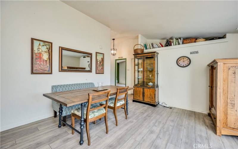 Dining room area leads to bedrooms and hall bath.