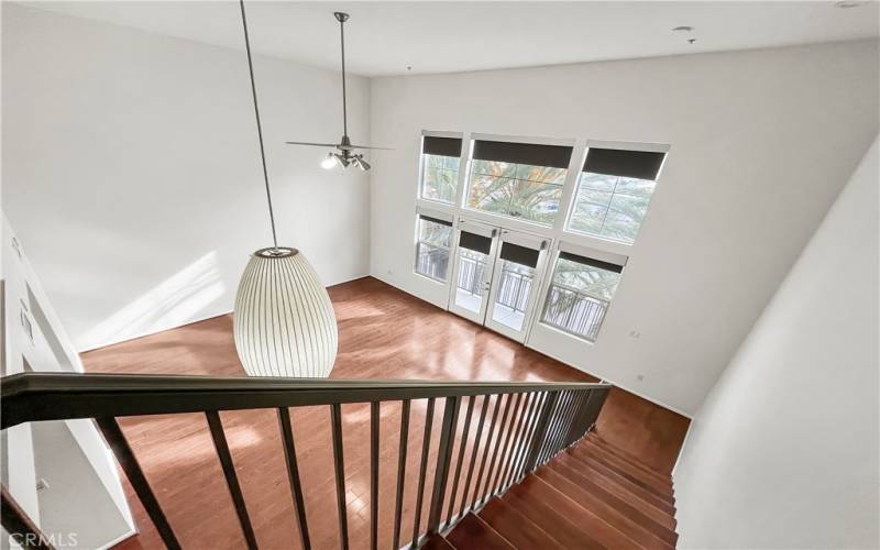 The mezzanine is on the 5th level of Stadium Lofts overlooking downstairs and a view of Anaheim below through the high windows