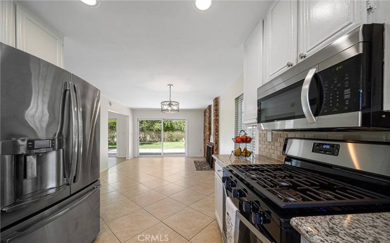 Kitchen with stainless appliances, granite counter tops