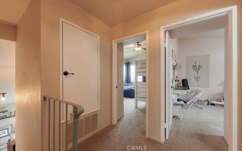 Looking from Master Bedroom to the other 2 Bedrooms upstairs.