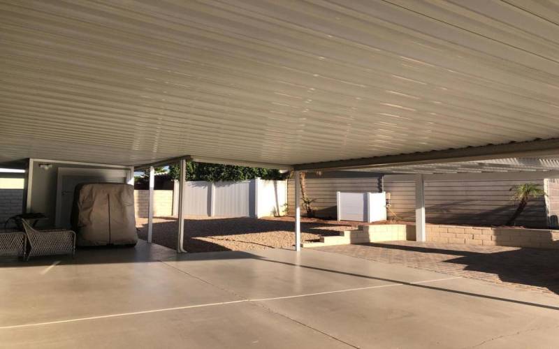 Spacious side carport