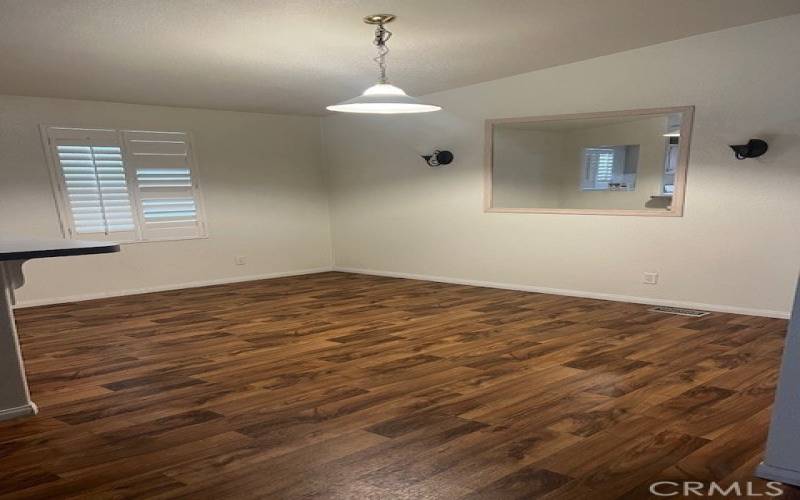 Formal Dining Room with Vinyl Plank Flooring and beautiful Plantation Shutters