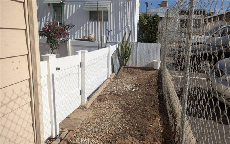 Lot extends to the chain link fencing. This could be the perfect area for a Garden!