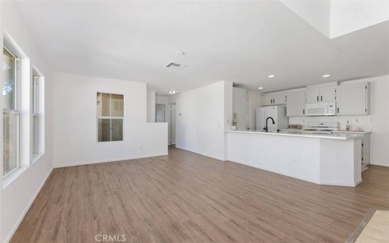 Living Room Looking onto Open Kitchen.