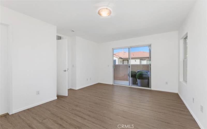 Secondary Master Bedroom with sliding glass door out to deck