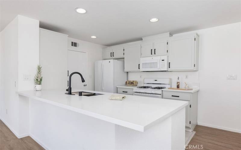 New Quartz Countertops, New Sink & Faucet. NOTE Breakfast Bar