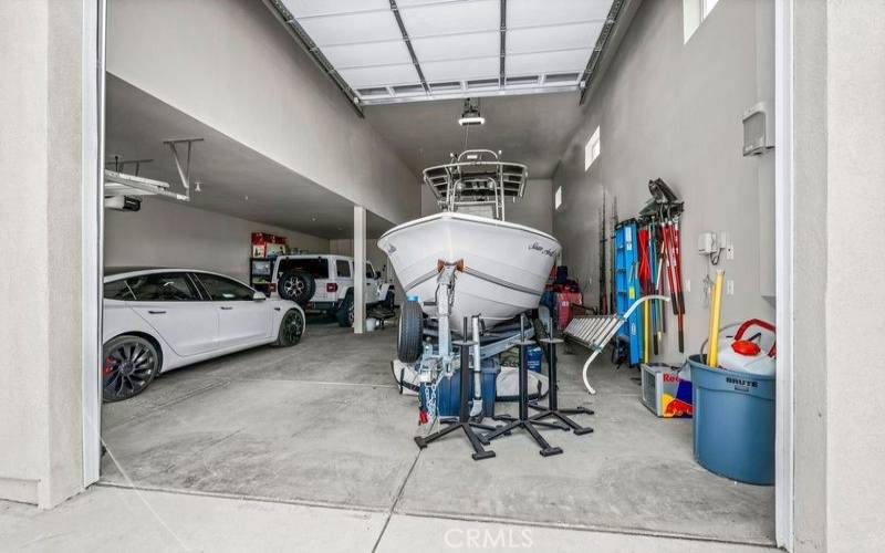 Massive RV/Boat garage. also Tandem garage for 2 cars. Electric car hook up