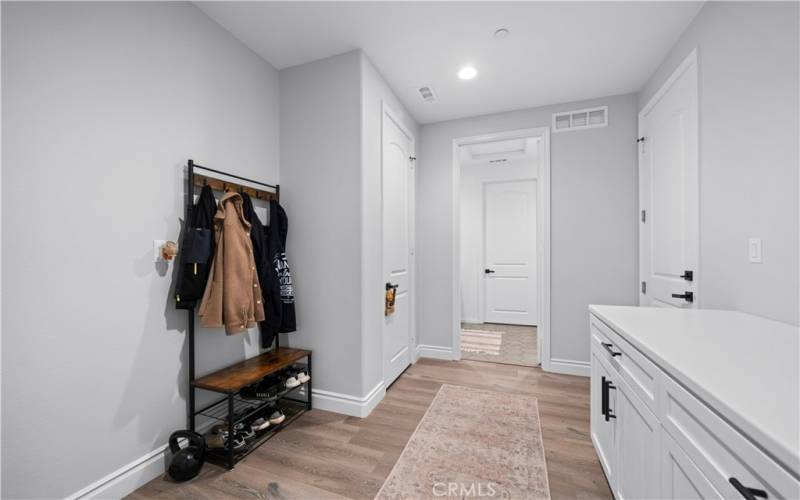 Mud room entrance from massive garage