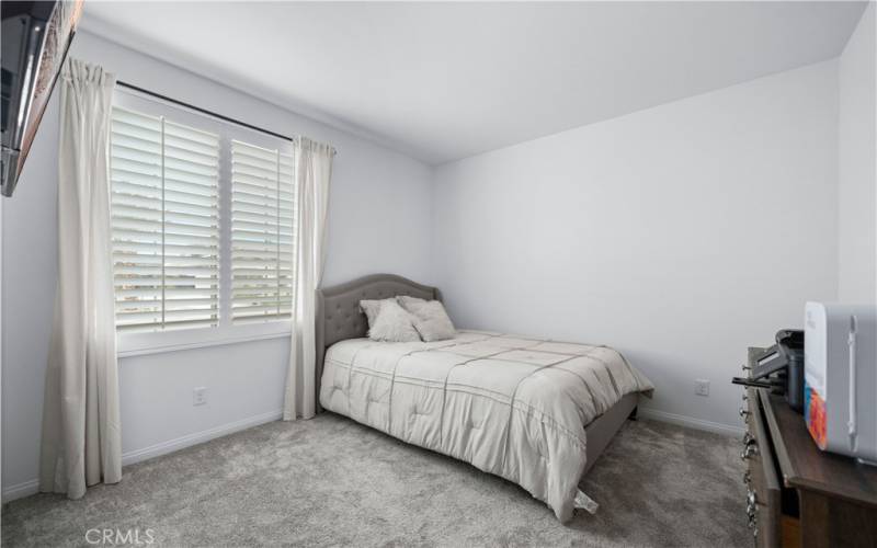 Front bedroom with walk in closet