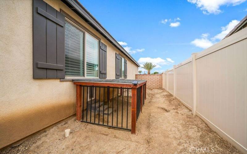 Concreted in Pet House with entrance from inside for complete protection when you are gone.