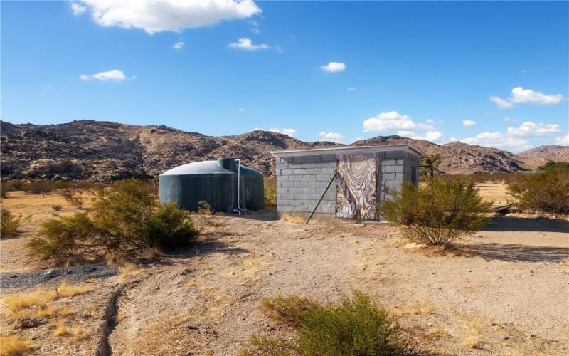 Well house and holding tank