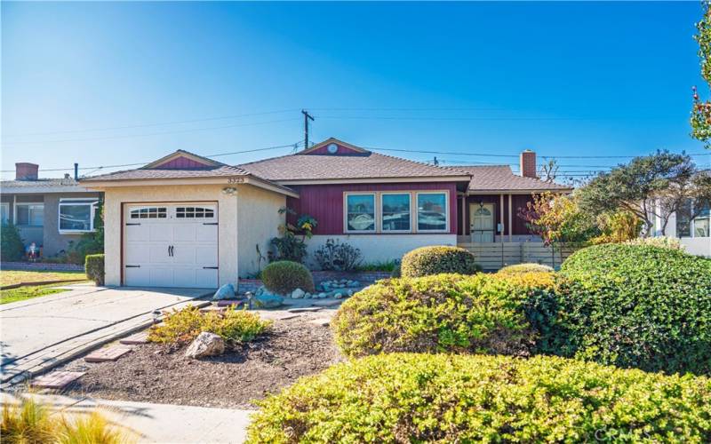 Expansive front yard with long driveway.