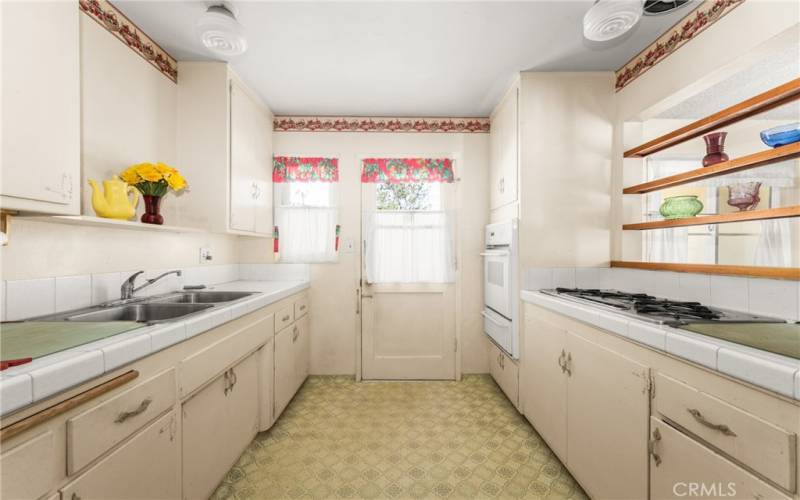 Kitchen with door to backyard