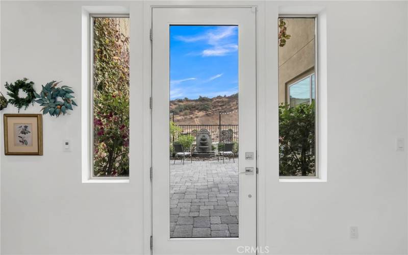 entrance to courtyard with a view of the mountains