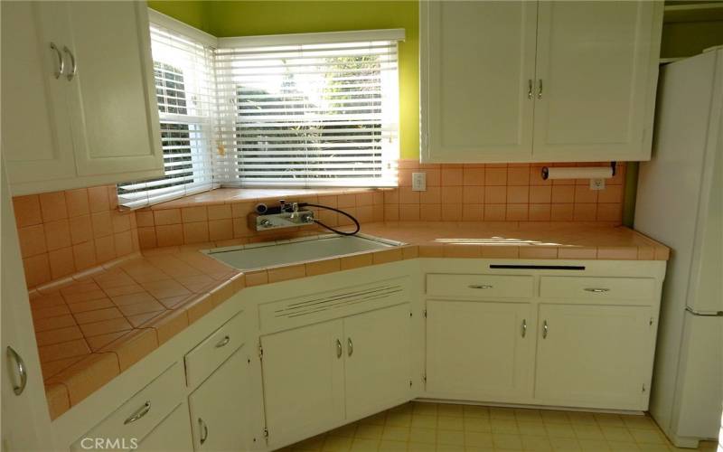 Functional kitchen layout, great backyard views from the sink area.