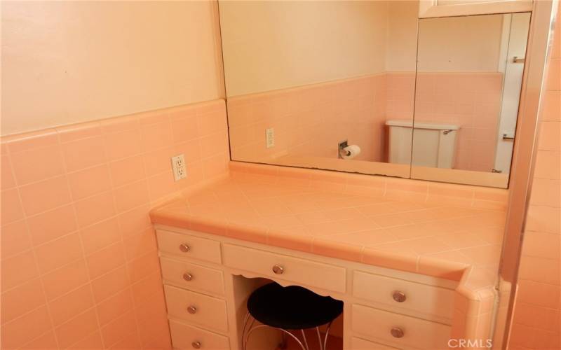 Bathroom vanity and makeup area.