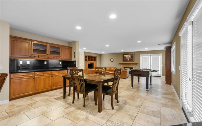 Eating area with buffet open to family room.