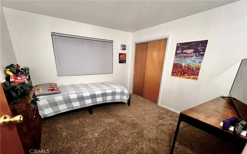 A second bedroom is the perfect space for additional guests, family, an office, or fitness area. It previously held a full-sized bunkbed, which is currently disassembled in the shed, and is available to the next owner, in addition to the twin-sized bed seen​​‌​​​​‌​​‌‌​​‌​​​‌‌​​​‌​​‌‌​​‌‌​​‌‌​​​​ here.