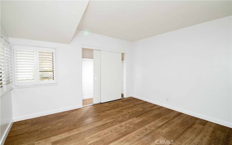 Bedroom 2 with large closet space.