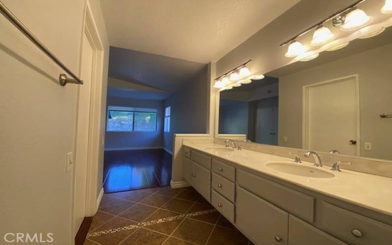 Double sink vanity in primary bathroom