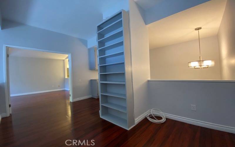 View from loft area into primary bedroom