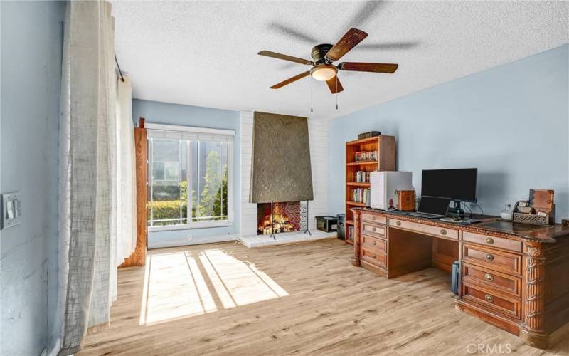 Living room with gas fireplace.