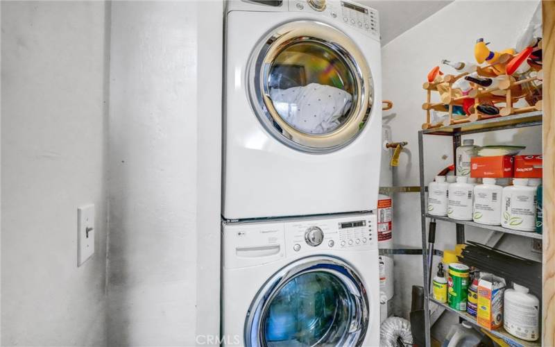 Indoor laundry room located next to the kitchen. Washer/dryer included.