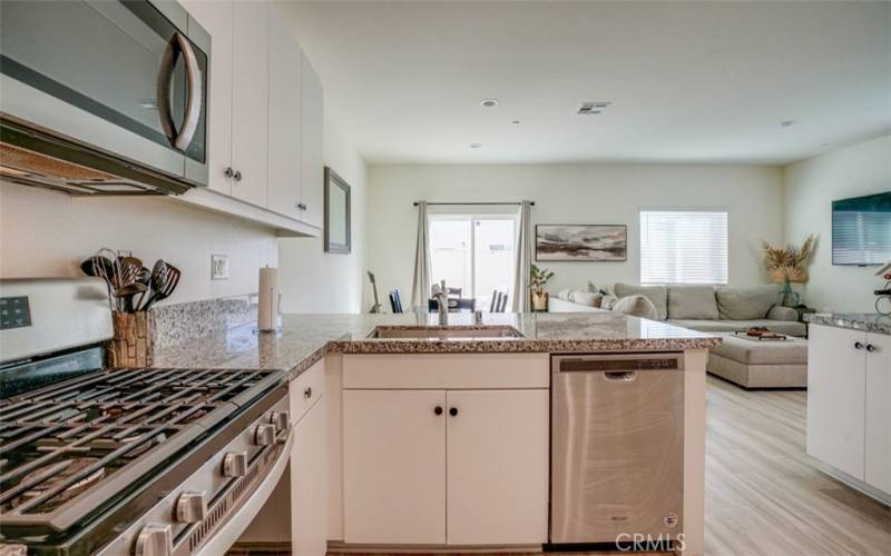 Kitchen Opens Up To Living & Dining Rooms