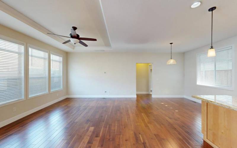 Living room with view to dining area on the right