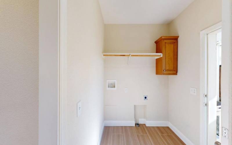 Laundry with access to the carport