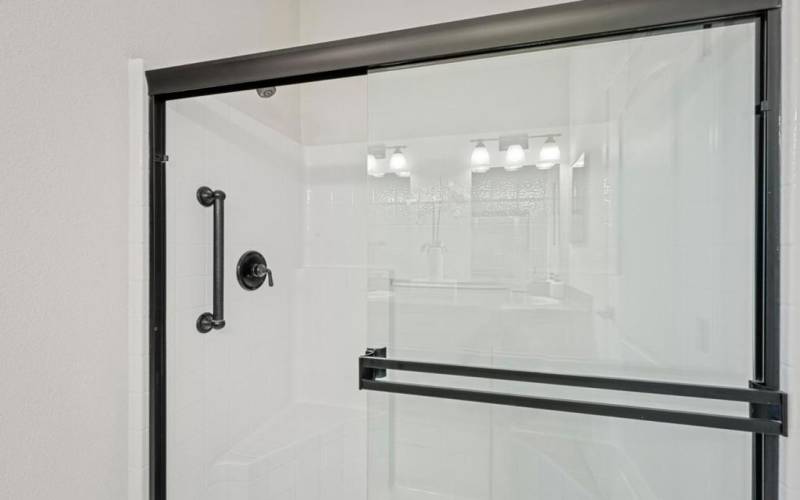 shower with sliding glass doors