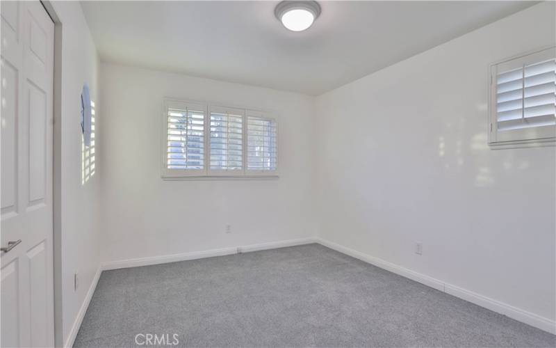 Master bedroom with built in closets.