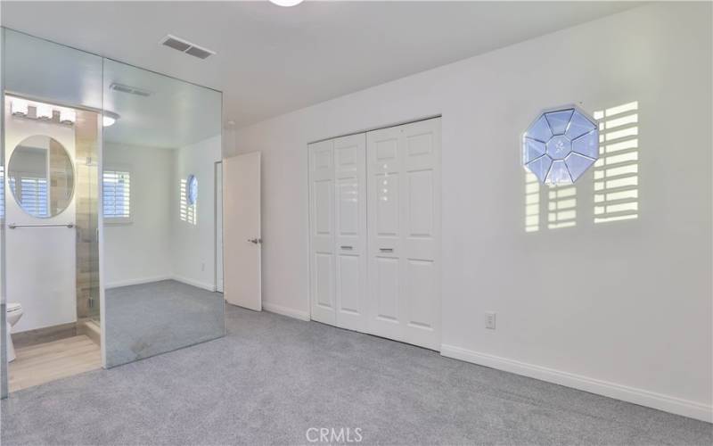 Master bedroom with built in closets.