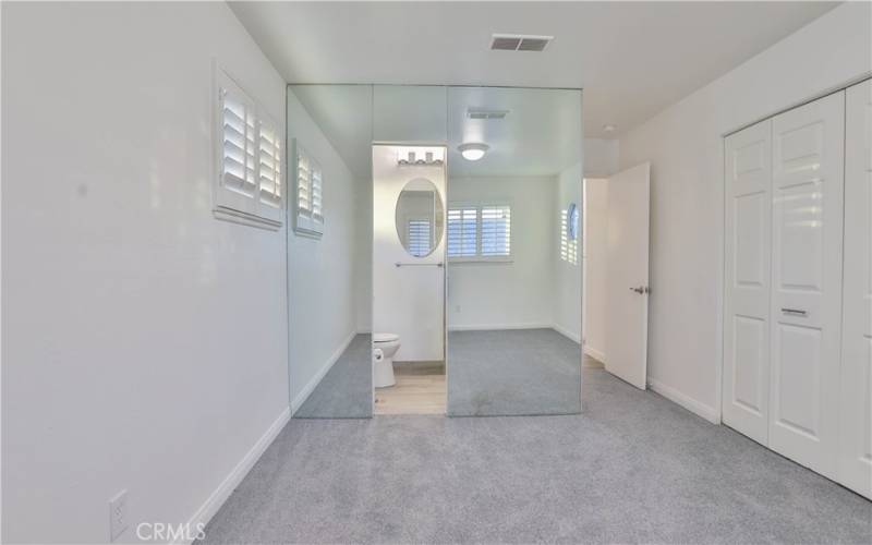 Master bedroom with built in closets.