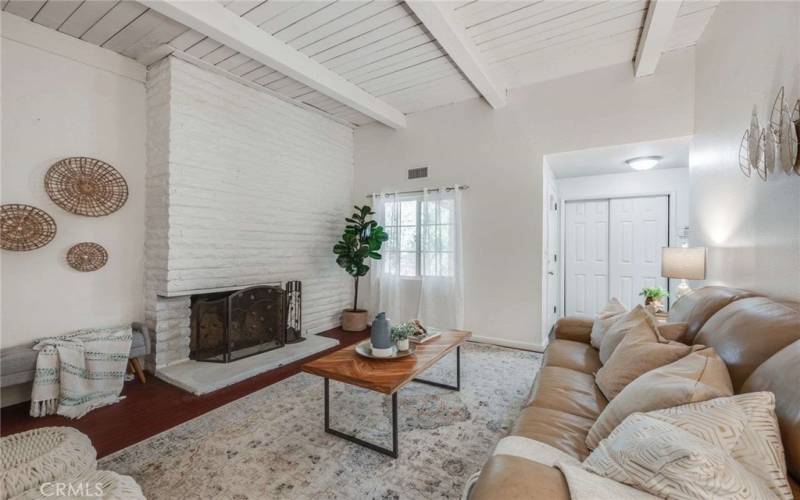 Beautiful Family Room with Beamed Ceilings